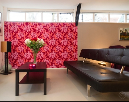 Sofa with center table and flowers
