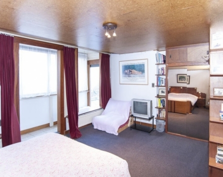 Double bed, mirror closet, futon couch bed, enclosed balcony, windows face neigh gardens