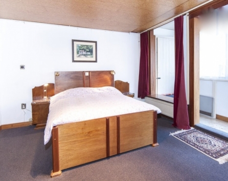 Spacious Bedroom with one double bed and enclosed balcony