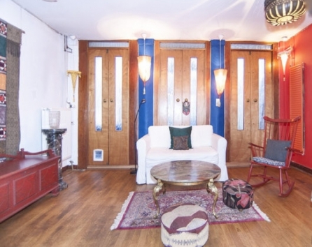 Living room, fold out couch, entrance to solarium when weather permits