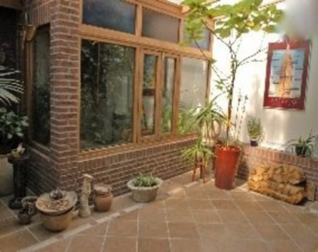 Solarium off the living room when weather permits