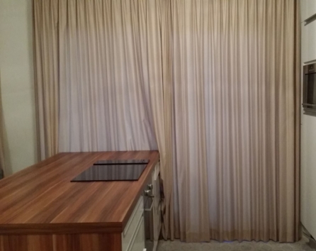 Kitchen with curtain closed