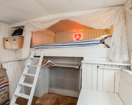 Guest bedroom with double high Bed