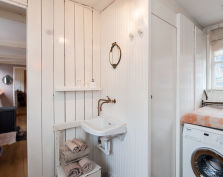 Guest bedroom with toilet and washing basin